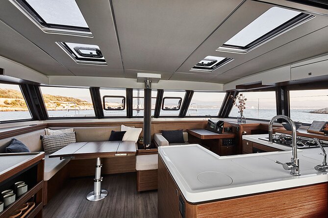 Santorini Private Tour Half-Day Sailing Platinum Catamaran Cruise - Hot Springs and the view into Caldera Bay