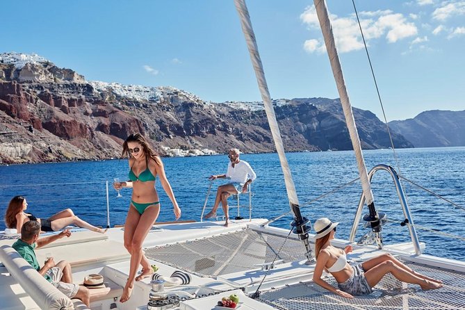Santorini Sunset Luxury Sailing Catamaran Cruise with BBQ, drinks, transfer - Why this cruise gives you a better view of Santorini