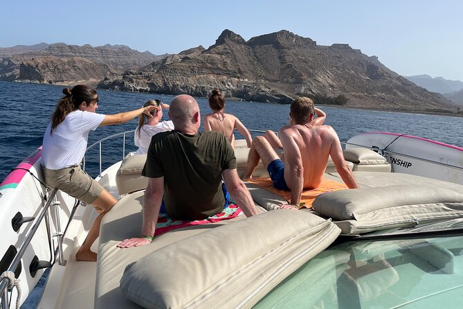 Shared Yacht Tour with Drinks Lunch and Snorkeling - Swimming and snorkeling at Playa del Perchel
