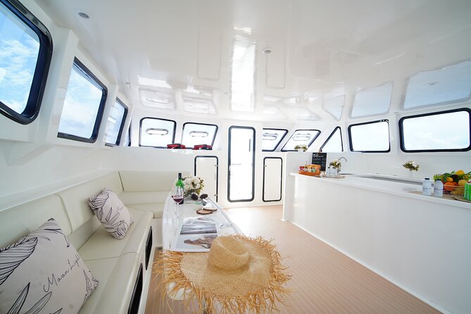 Similan Islands Luxury Catamaran Day Tour (Phuket / Khao Lak) - Crew service and the onboard photographer