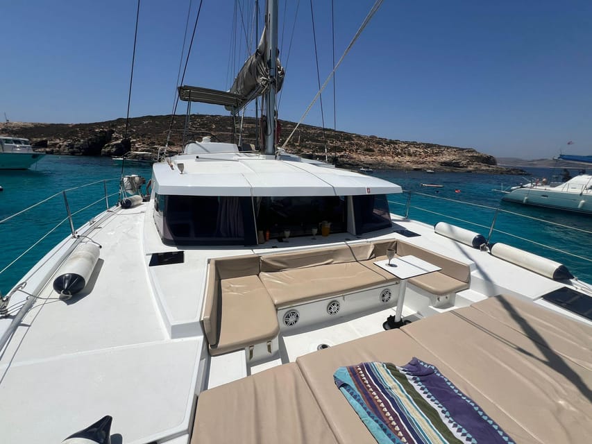 St. Paul's Bay: Half-Day Luxury Catamaran Tour with Drinks - One hour at Blue Lagoon