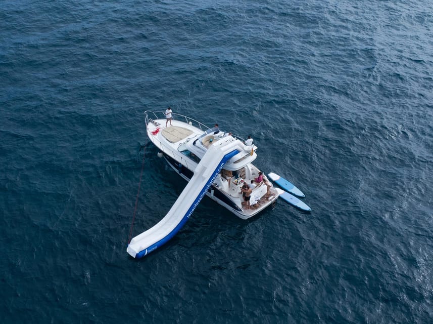 Tenerife: Shared Yacht Cruise with Champagne and Tapas - Leaving Puerto Colon with champagne