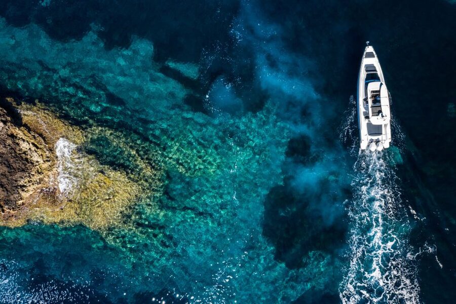 The Fastest All Inclusive Private Motor Yacht in Santorini - Sunset, champagne-style touches, and the return