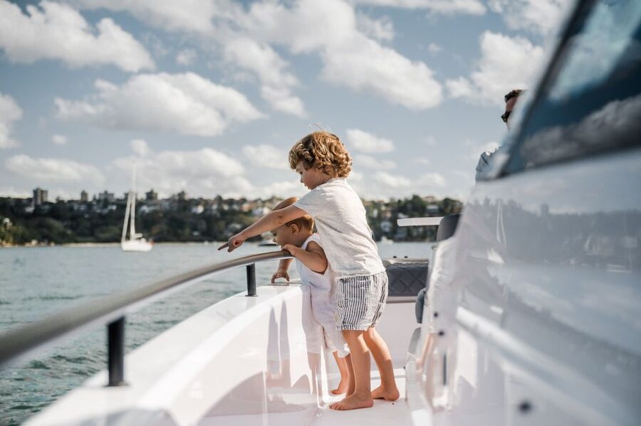 The Fastest All Inclusive Private Motor Yacht in Santorini - Swimming beneath Oia