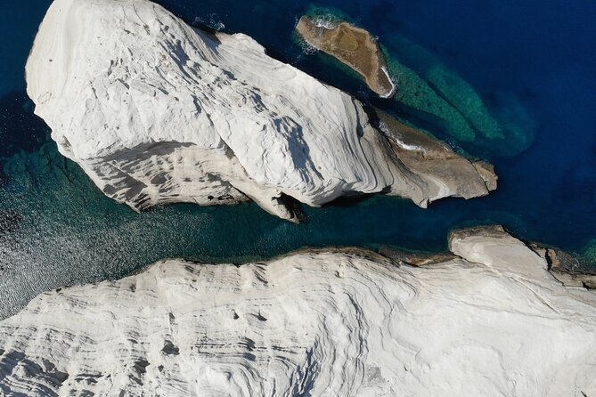 Three Greek Islands Full-Day Private Luxury Boat Tour - Old Sulfur Mines, color, and abandoned buildings