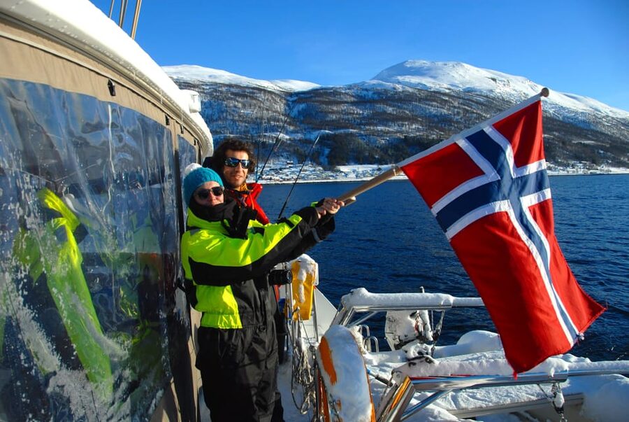 Tromsø: Fjord and Islands Luxury Catamaran Cruise - Thermal suits, day beds, and the battle against the cold